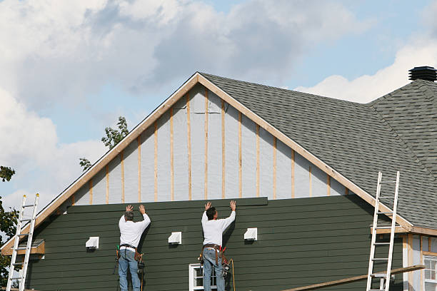 Professional Emergency Siding Repair technician working in Simpson, NC